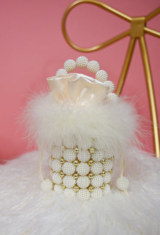 Pearl bag with white feather